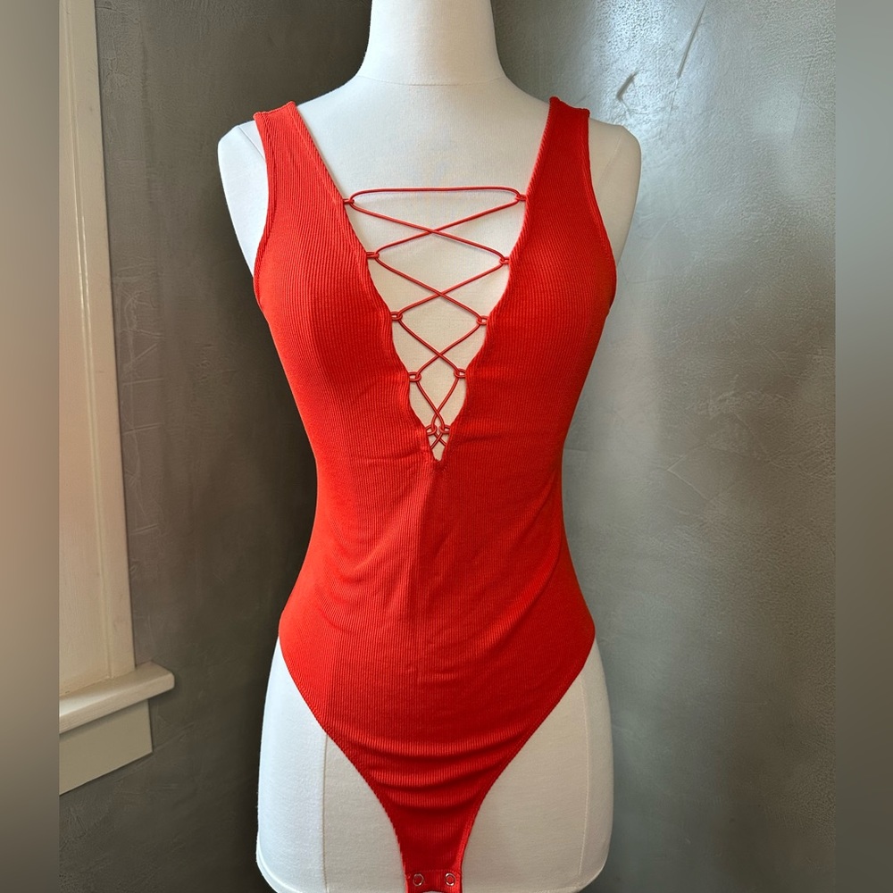 NWOT - Orange Strappy Bodysuit
